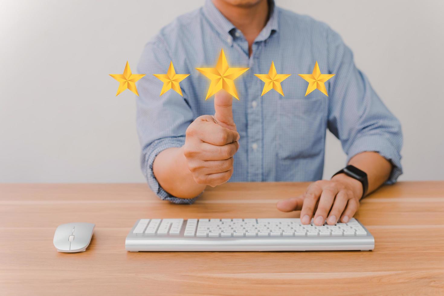 Businessman hand touching five star symbol to increase rating of company concept photo