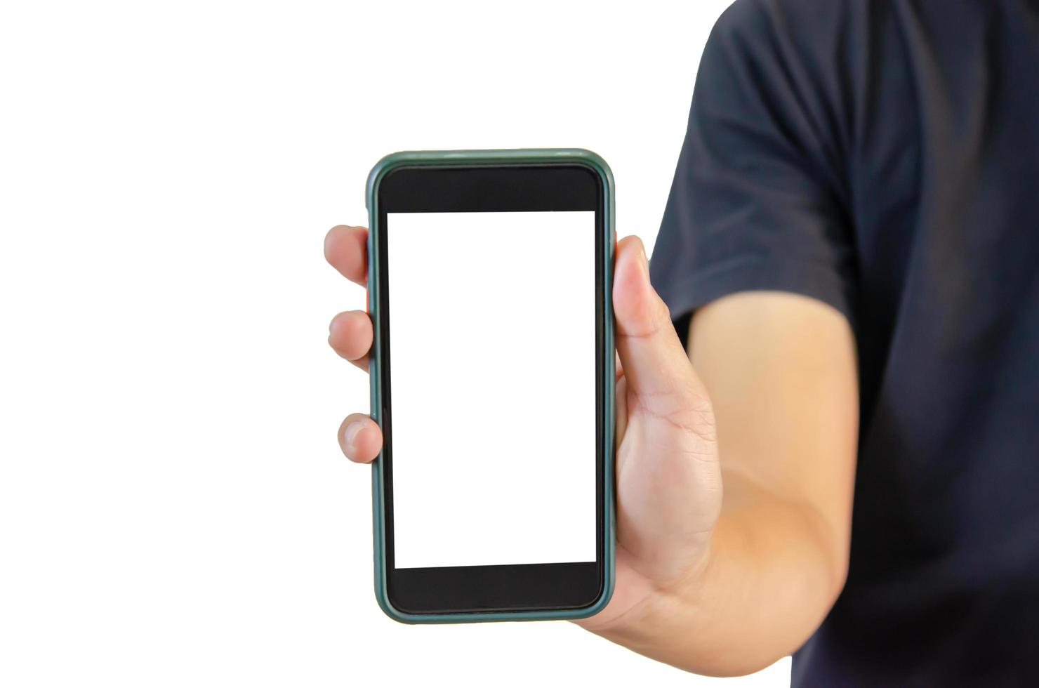 Hand holding a smartphone on a white background. White blank phone screen. photo