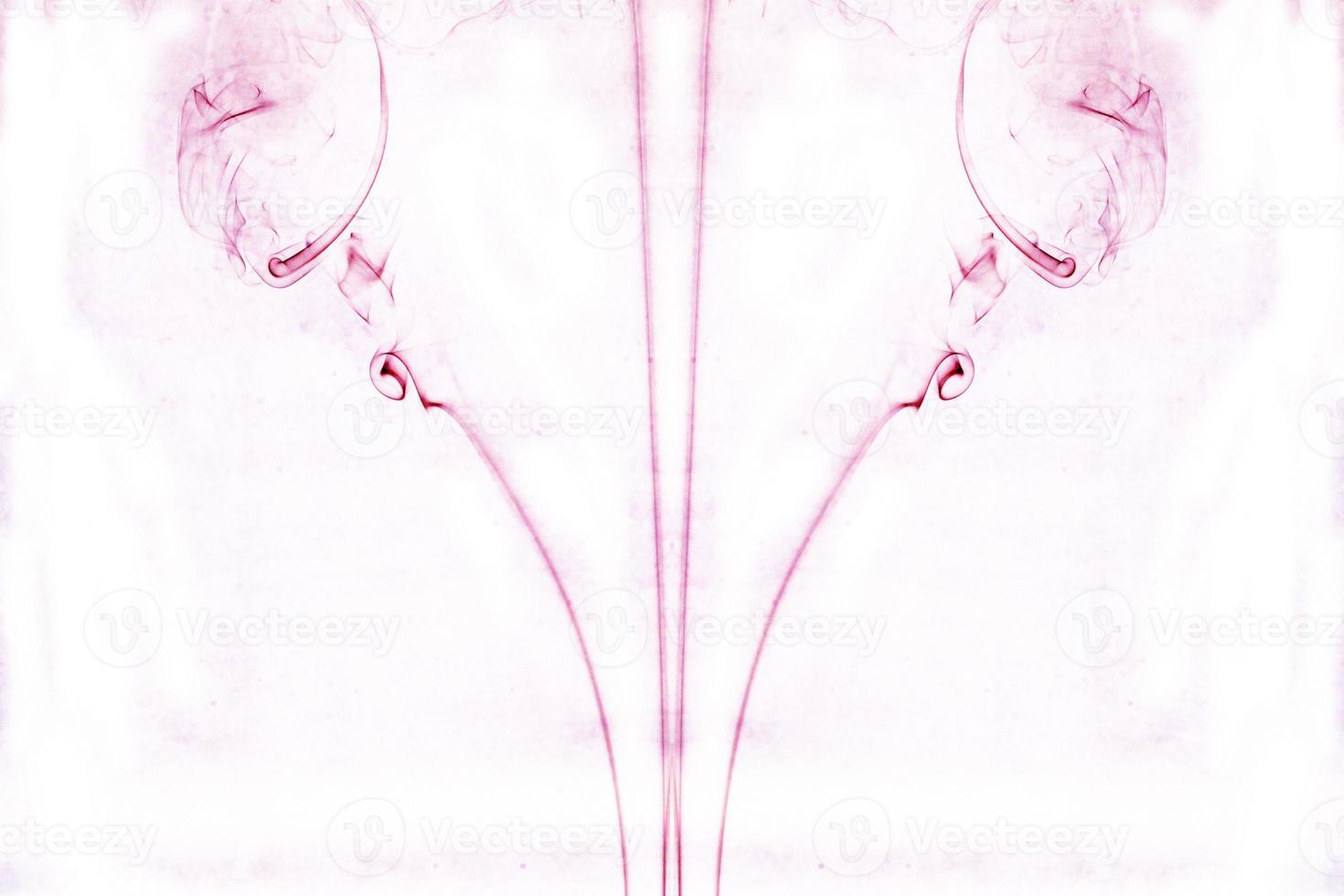 Abstract smoke swirls on white background photo
