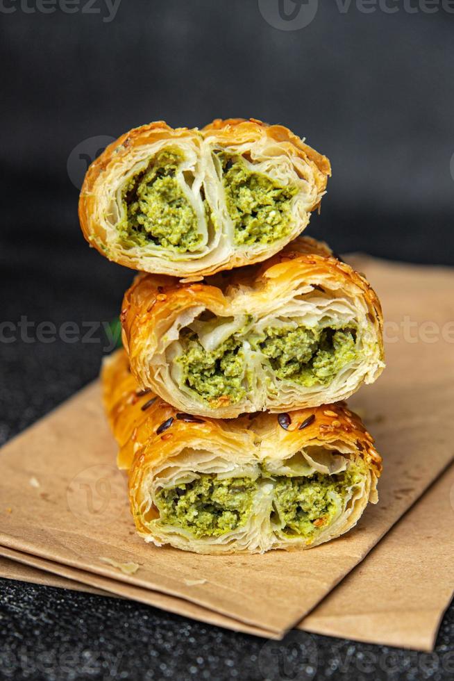 rollini phyllo pastry spinach, cheese, cream cheese savory pastries ready to eat photo