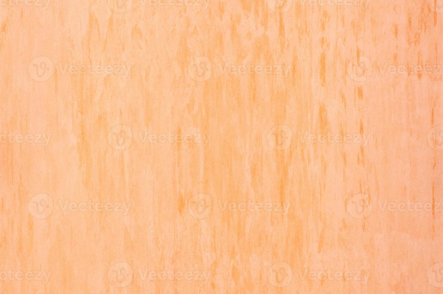 background of the plastered texture carrot color. artistic background handmade photo