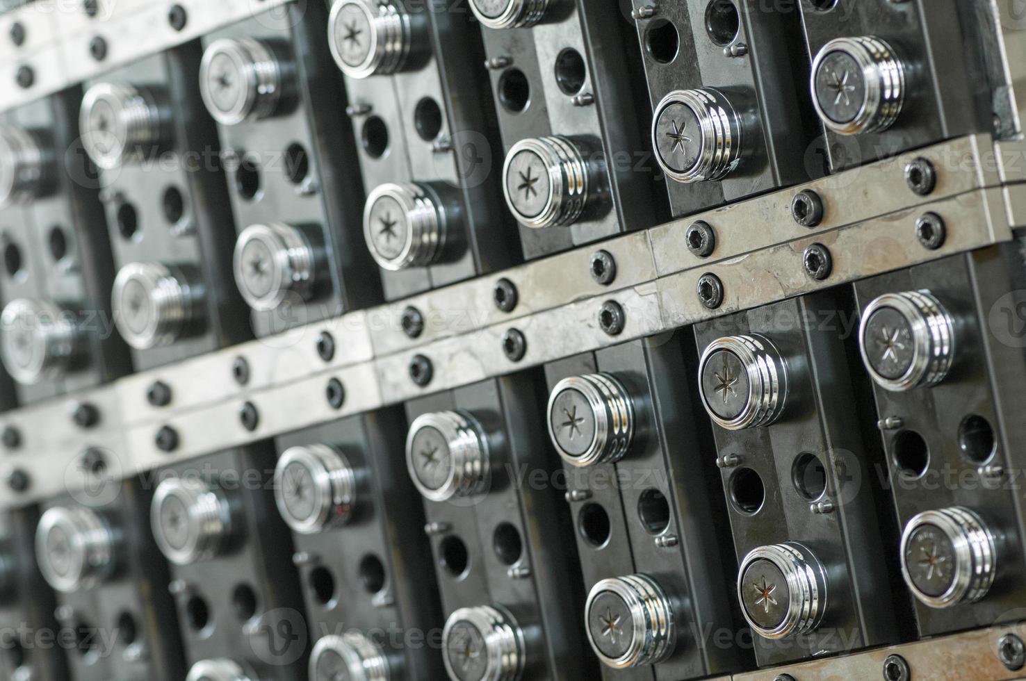 Equipment for the manufacture of preforms for plastic bottles photo