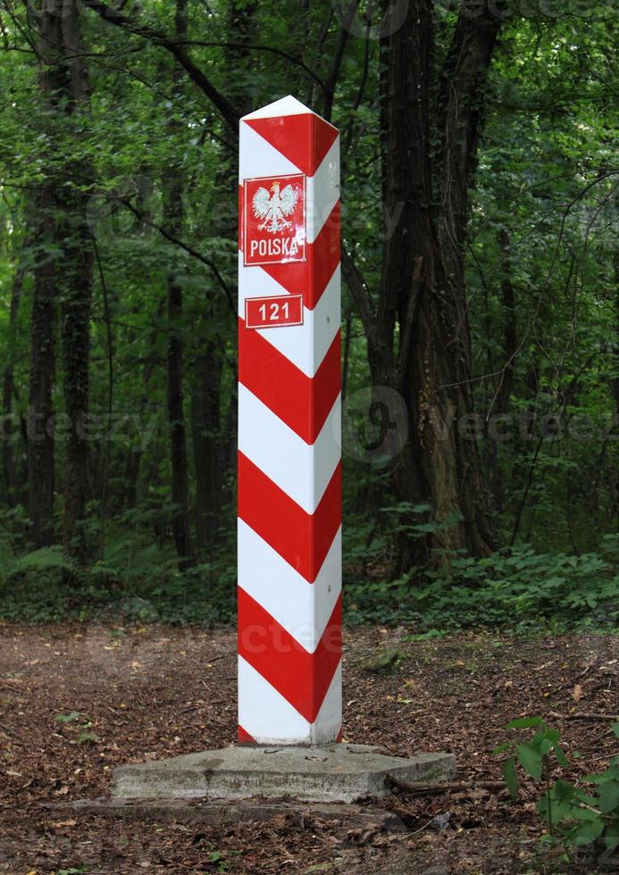 Republic of Poland border sign at forest photo