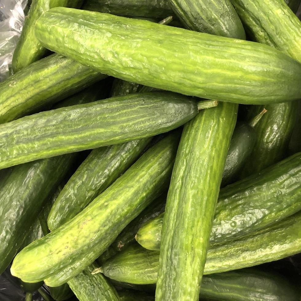 Macro photo green fresh eggs. Stock illustration vegetable green cucumbers