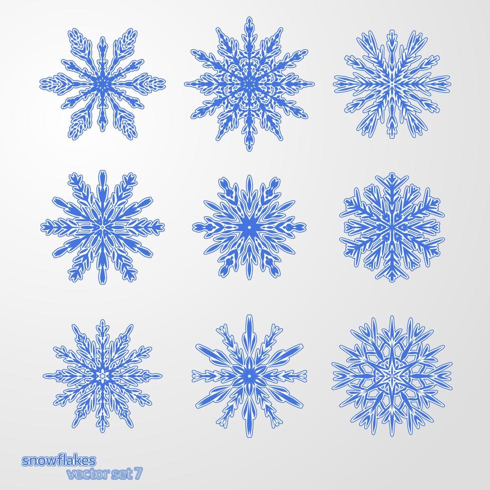 set 9 copos de nieve azules diferentes vector