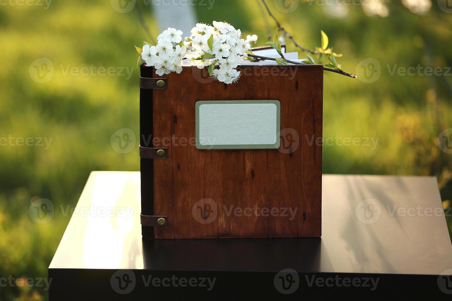 wooden photobook on the table. place for the inscription photo