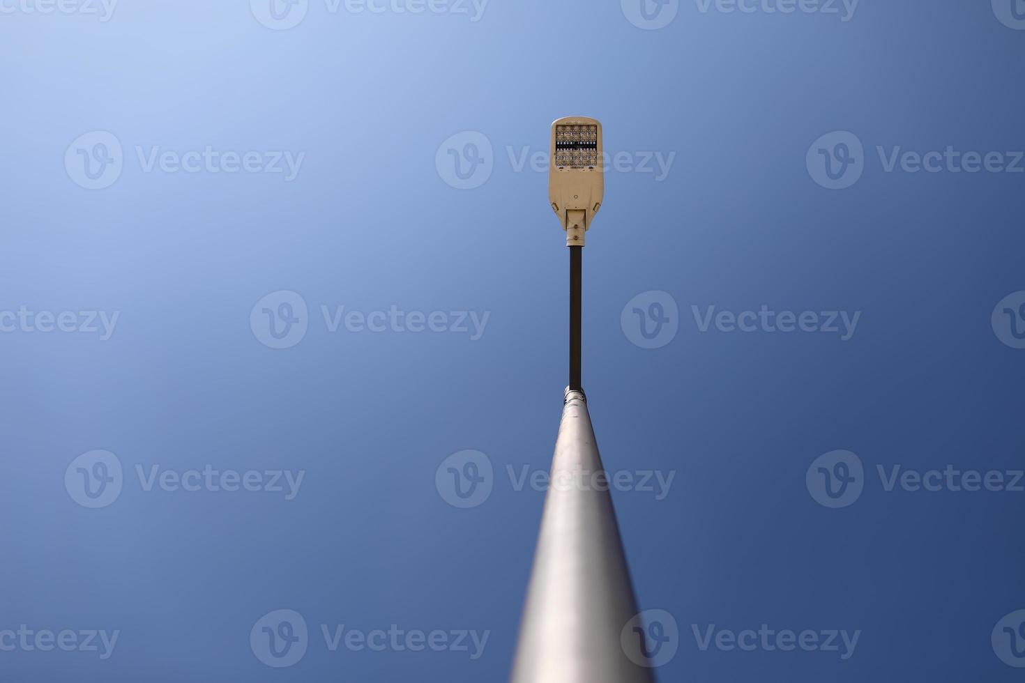 Lamppost on blue sky background. modern lamppost. copy spece photo