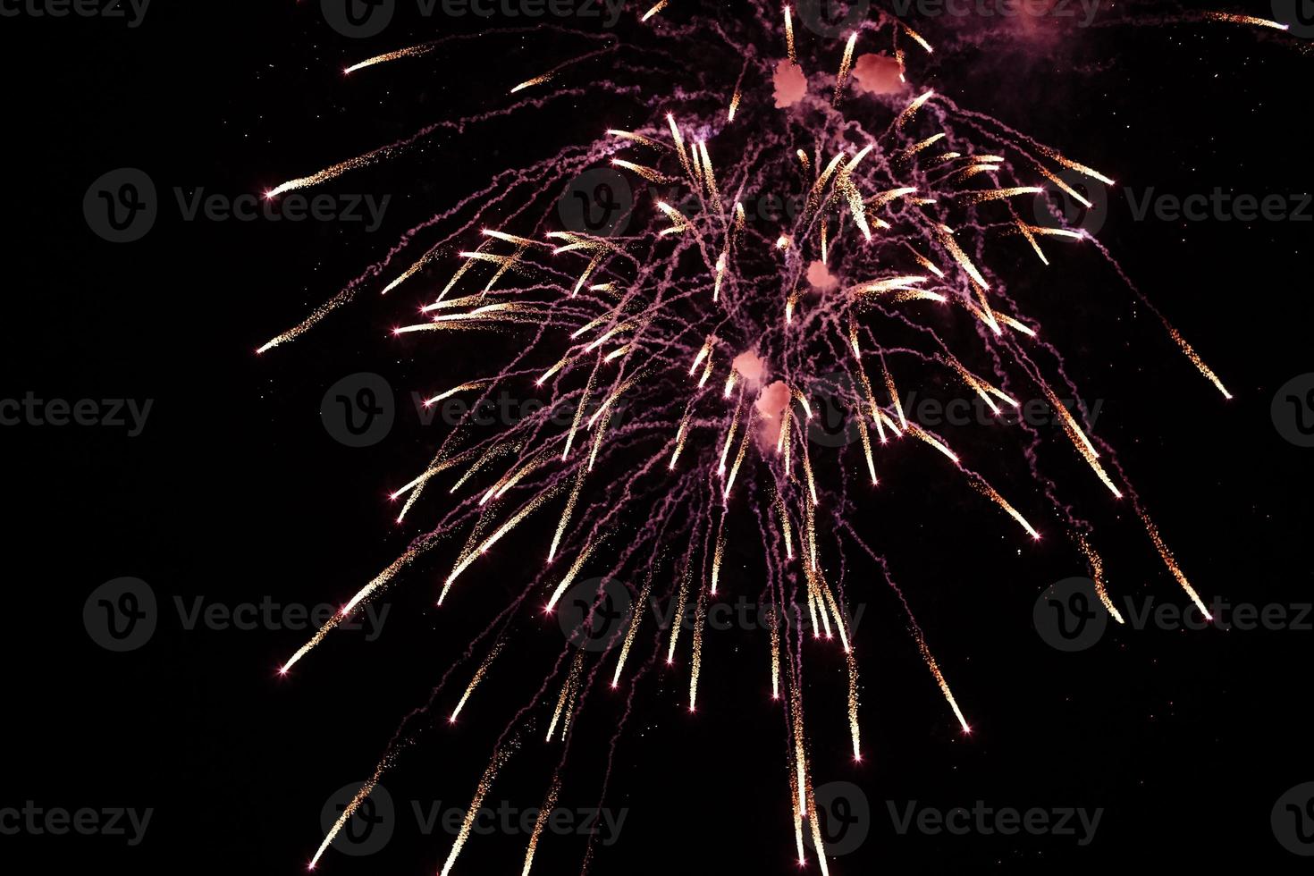 Real colored Fireworks on Deep Black Background Sky on Fireworks festival show before independence day on 4 of July photo