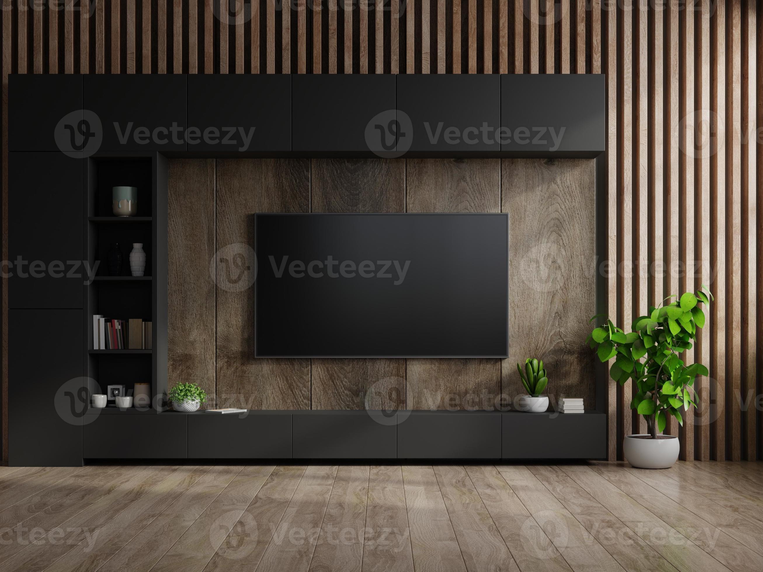 tv en el gabinete en la sala de estar moderna con lámpara, mesa, flor y planta sobre fondo de pared de madera. de stock en Vecteezy