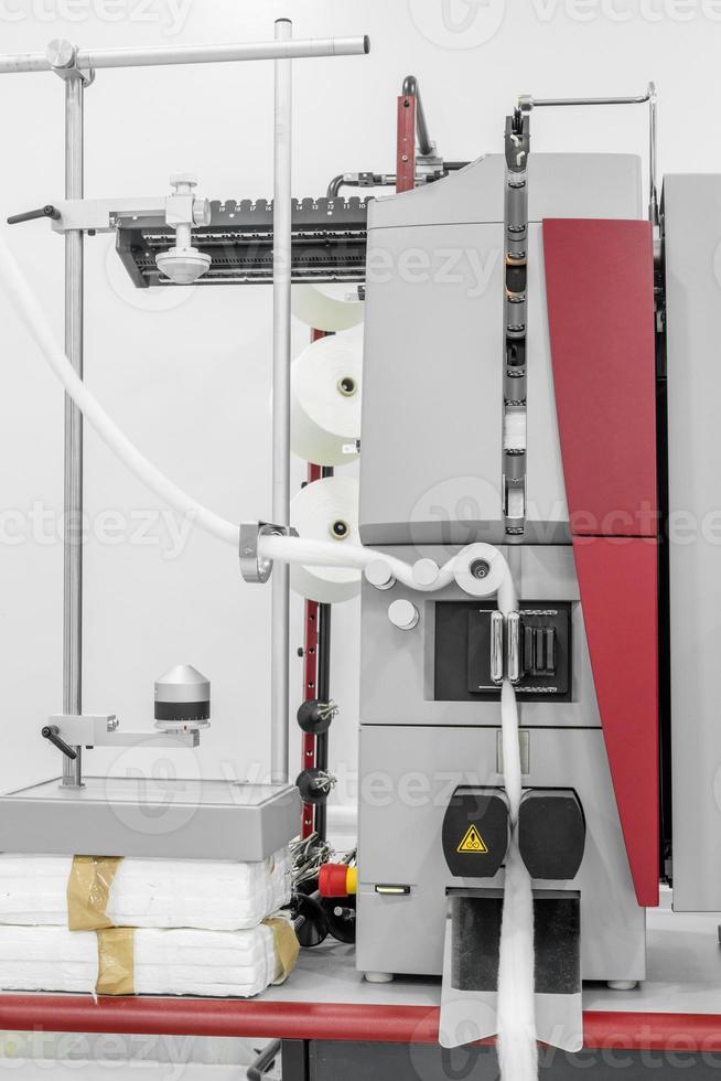 laboratory equipment checks the quality of cotton fiber in a textile factory photo