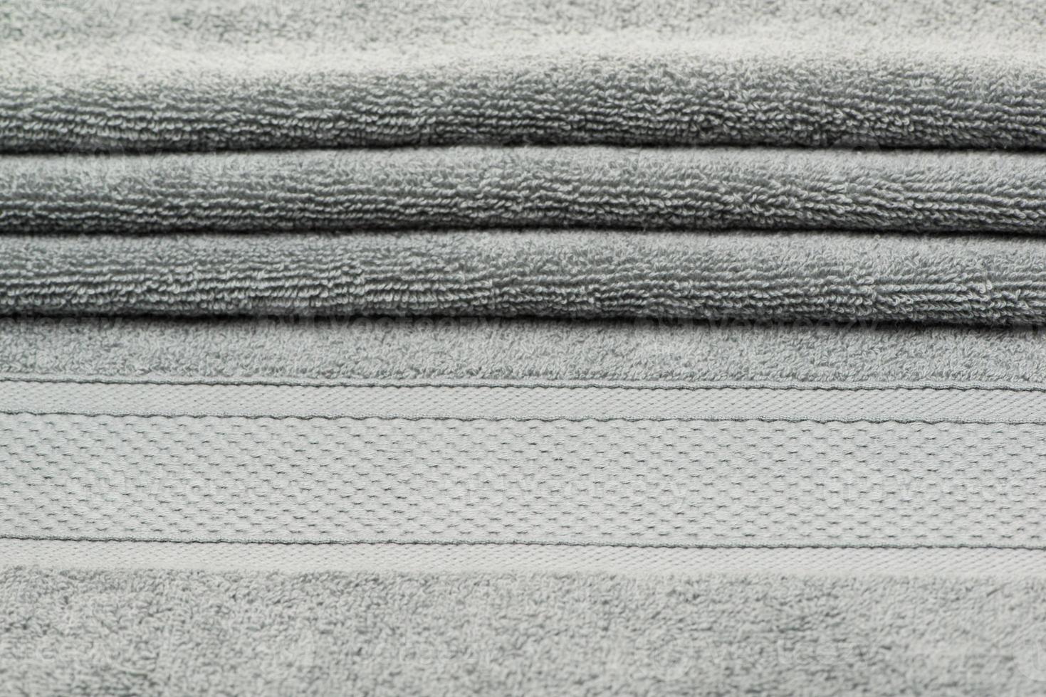 bath towel with folds. textured fabric background photo