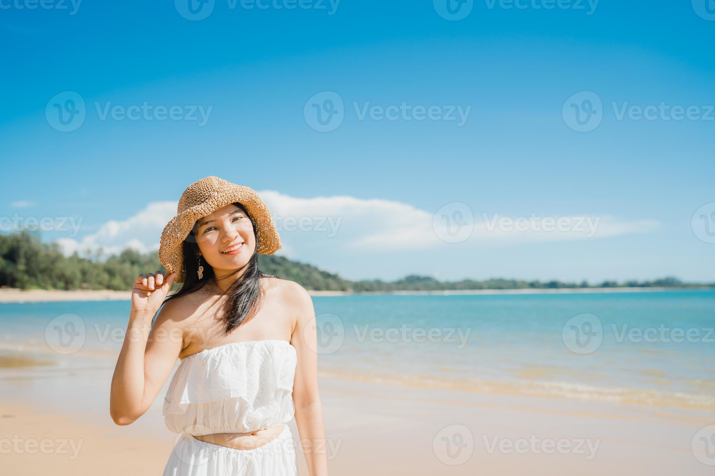 Beautiful young Asian woman happy relax