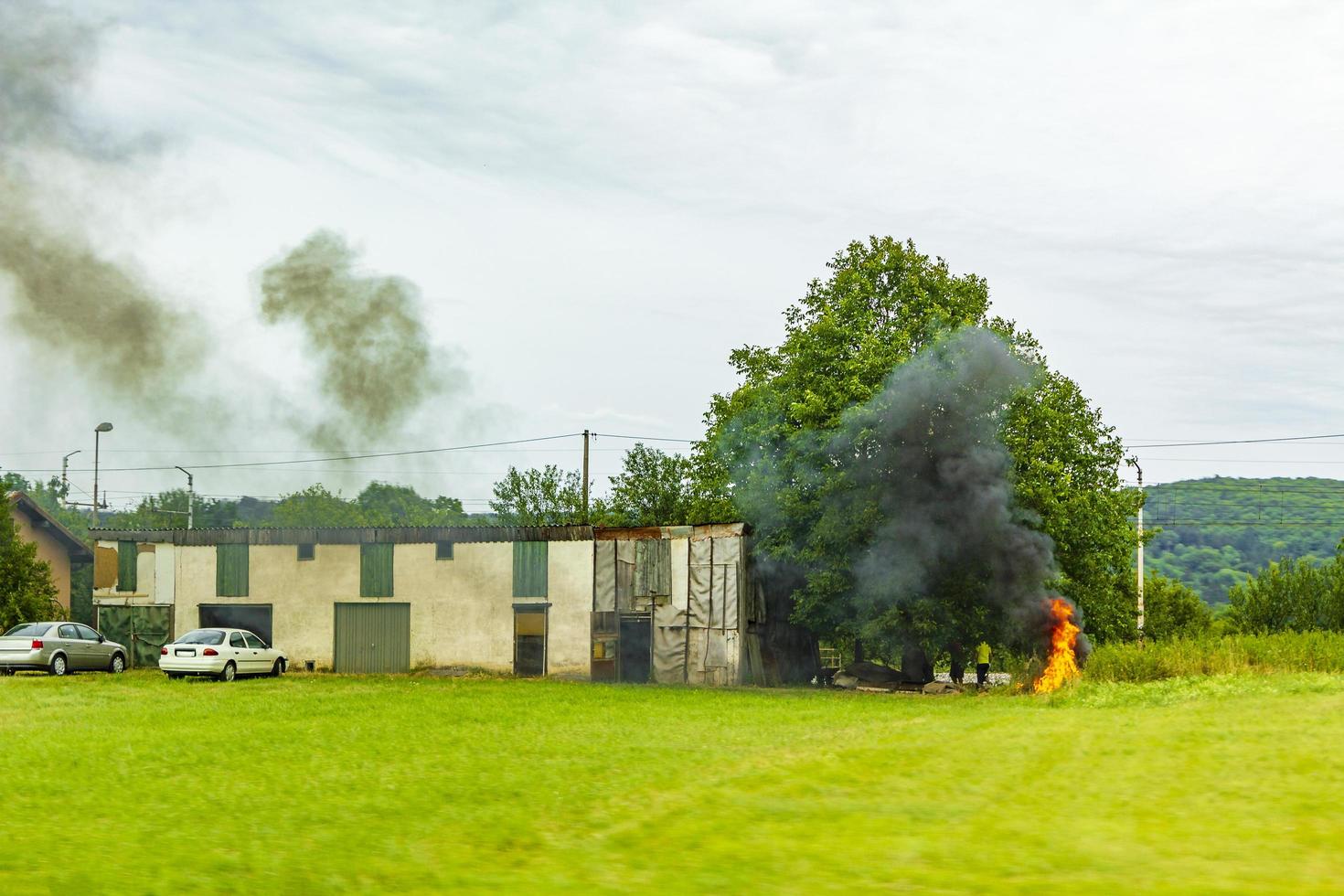 Poisonous cloud of smoke from the farmers' fireplace in Slovenia photo