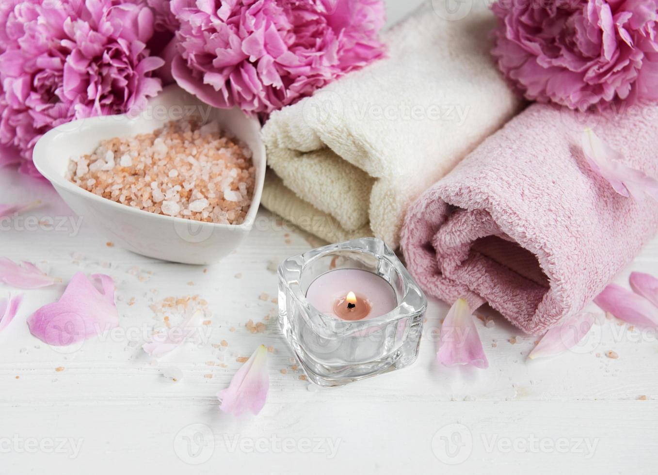 Massage salt and peony flowers photo