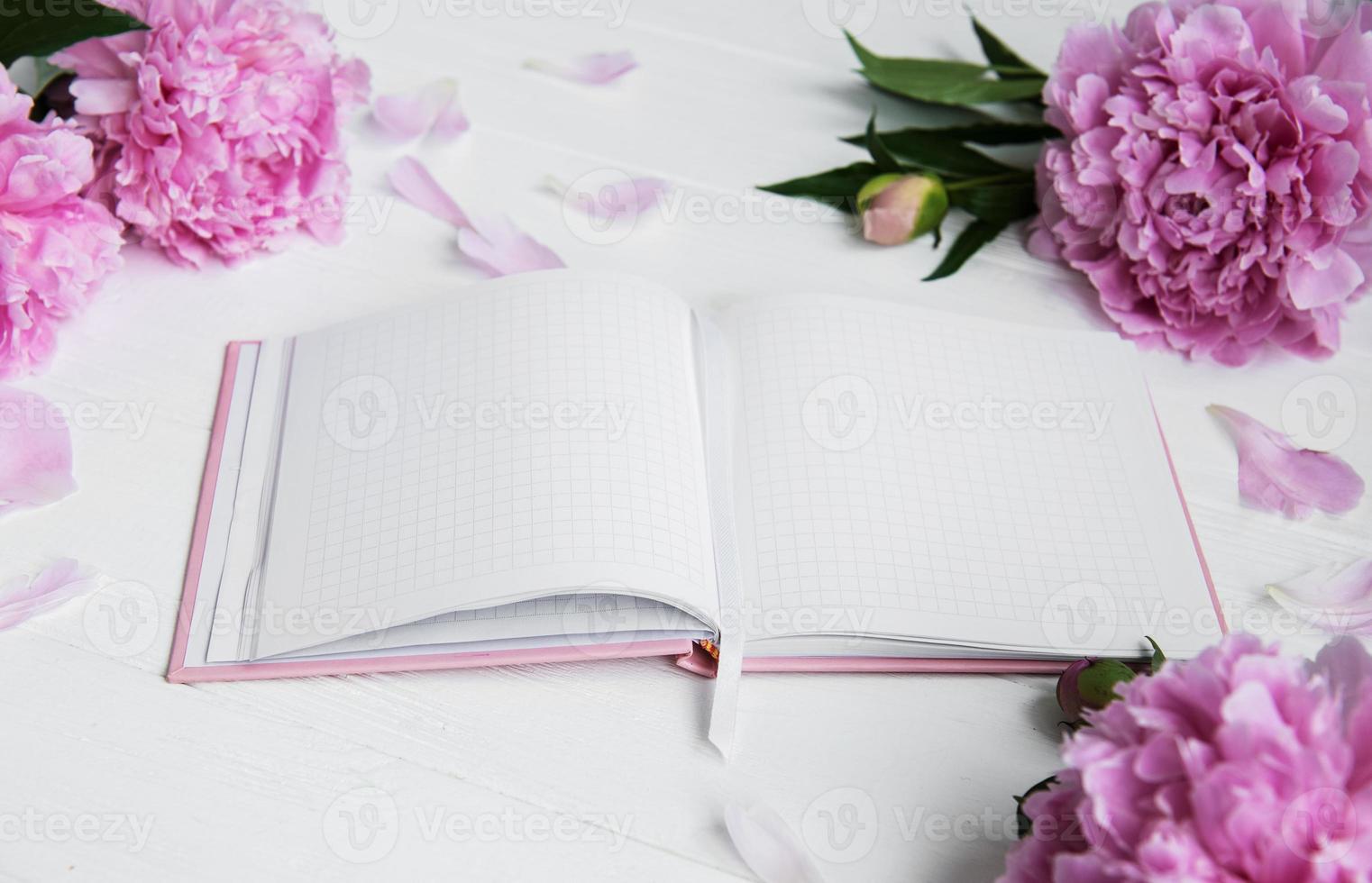 note book with peonies photo