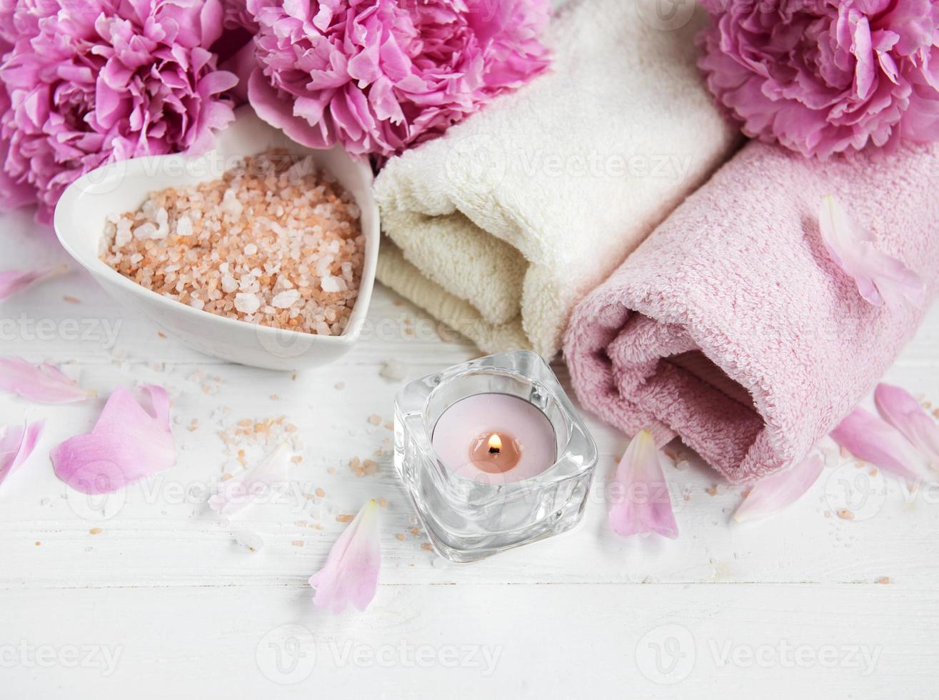 Massage salt and peony flowers photo
