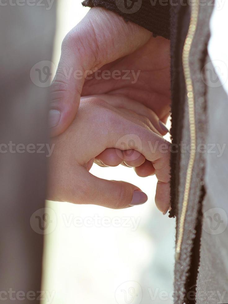 hands of two people in love. Love, support, friendship and relationship concept photo