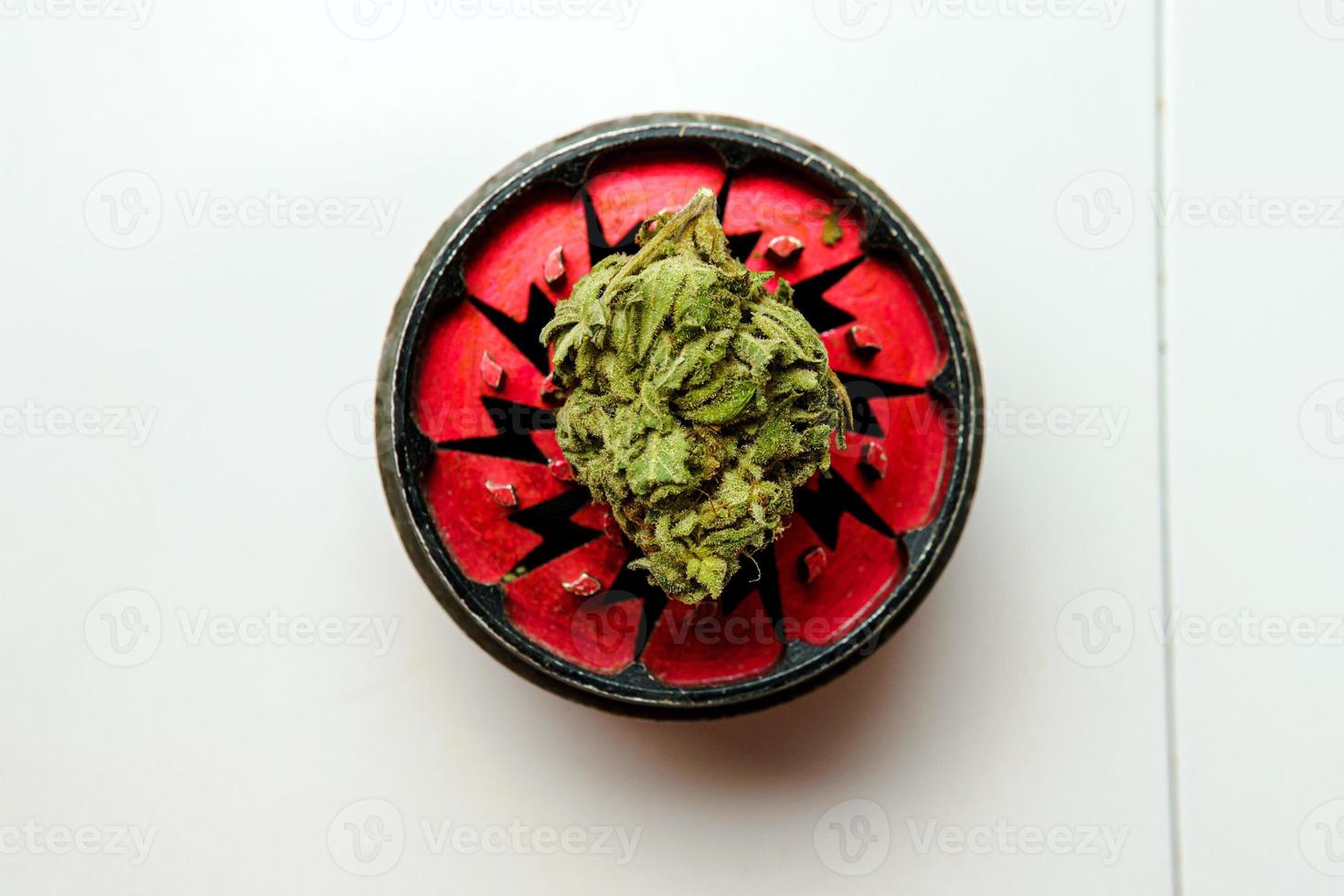 Close-up of medical marijuana buds on white background photo