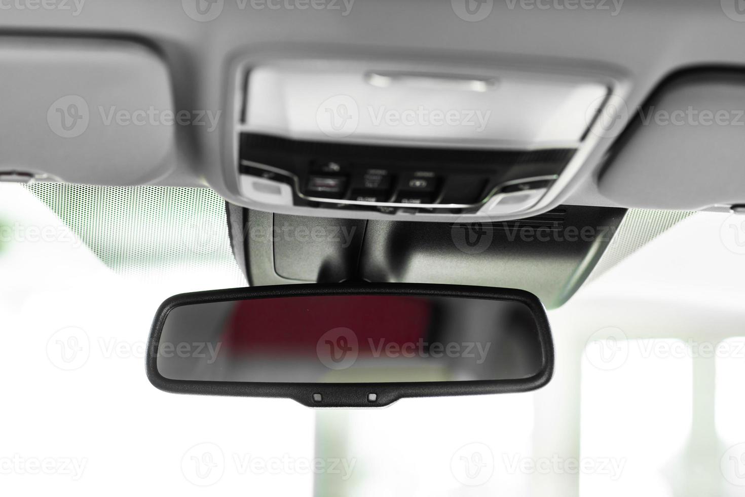 rear view mirror. details of stylish car interior, leather interior photo