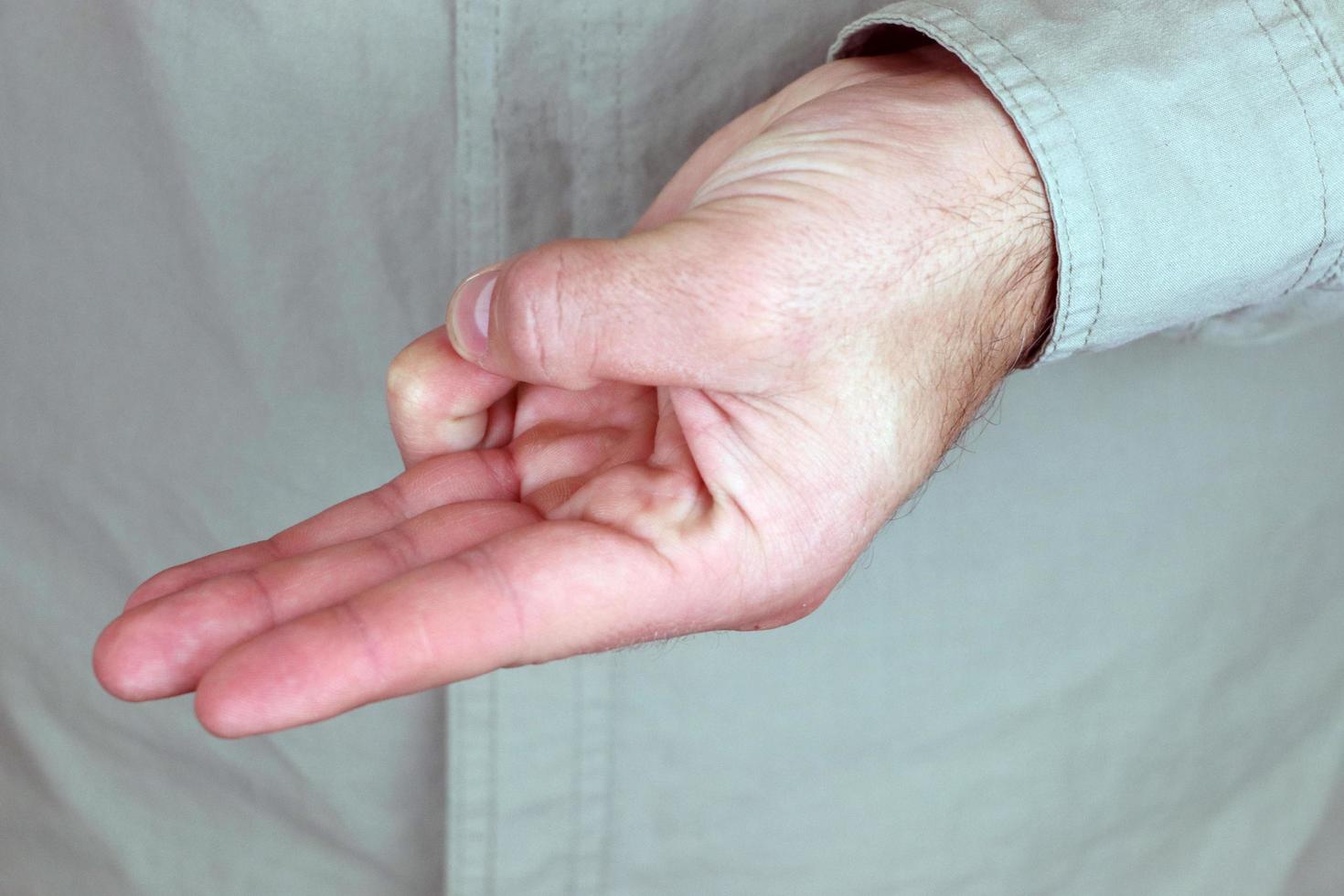 Varun mudra. Yogic hand gesture. Hand spirituality hindu yoga of fingers gesture. photo