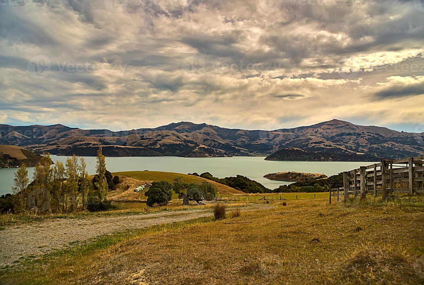 View over the top of the hill in Akaroa photo