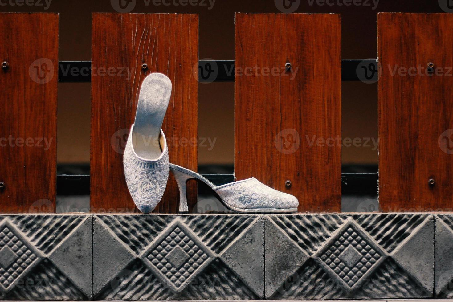 Elegant white wedding shoes photo