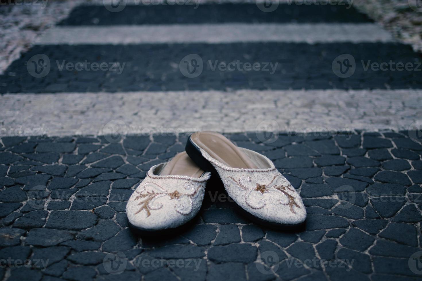Elegant white wedding shoes photo