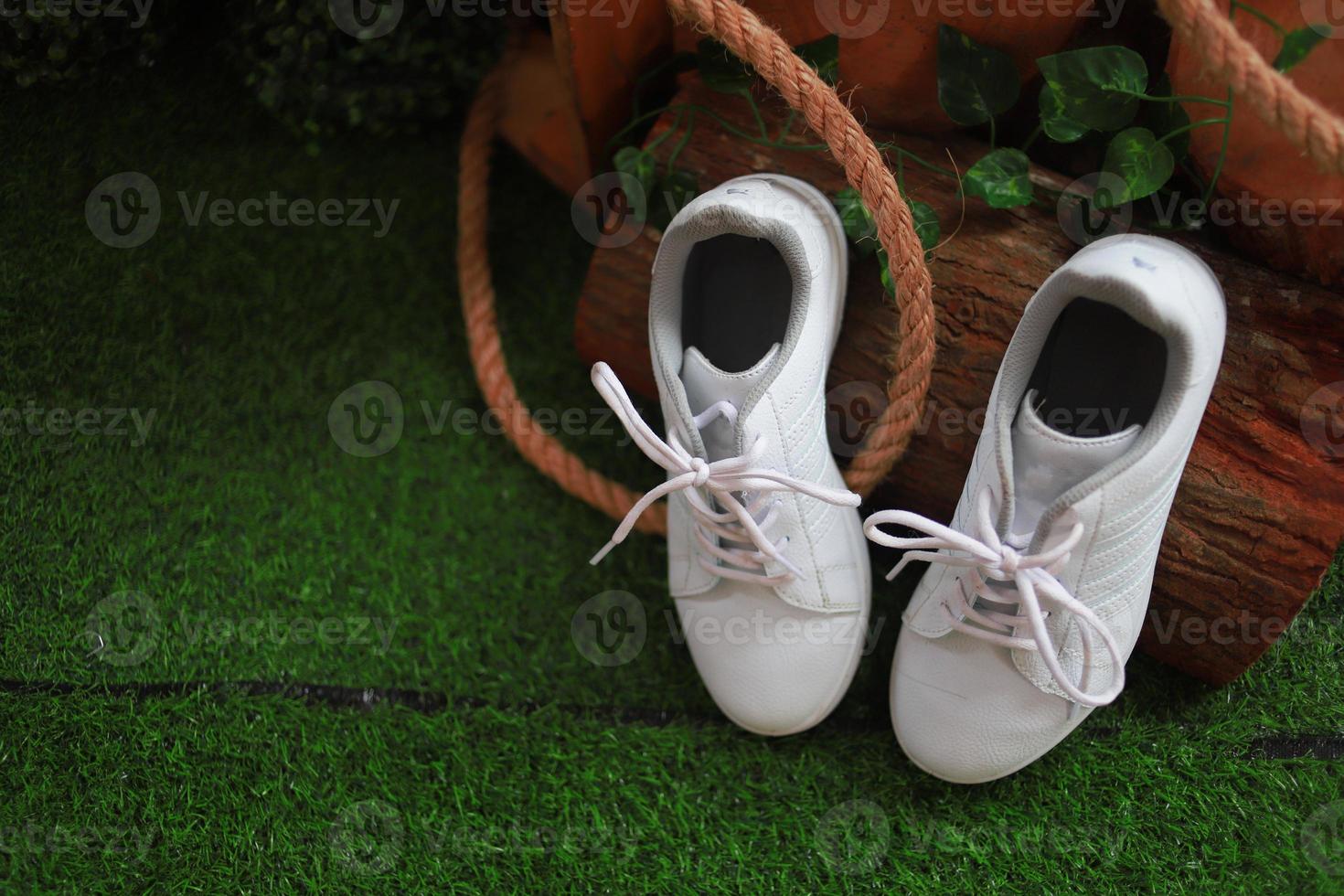 Elegant white wedding shoes photo