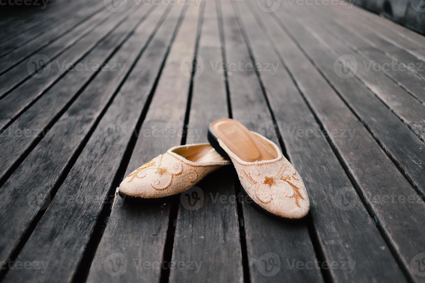 Elegant white wedding shoes photo