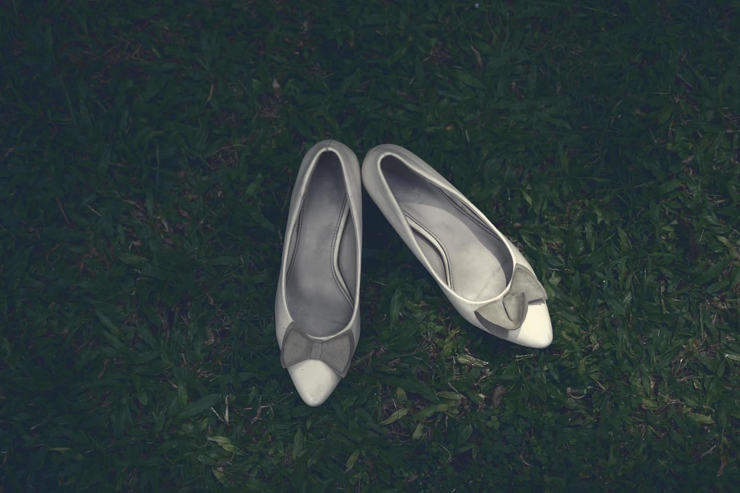 Elegant white wedding shoes photo