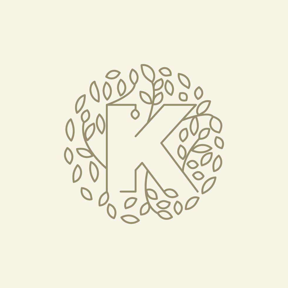 initial K or letter K with leaf  ornament on circle luxury modern logo vector icon illustration design