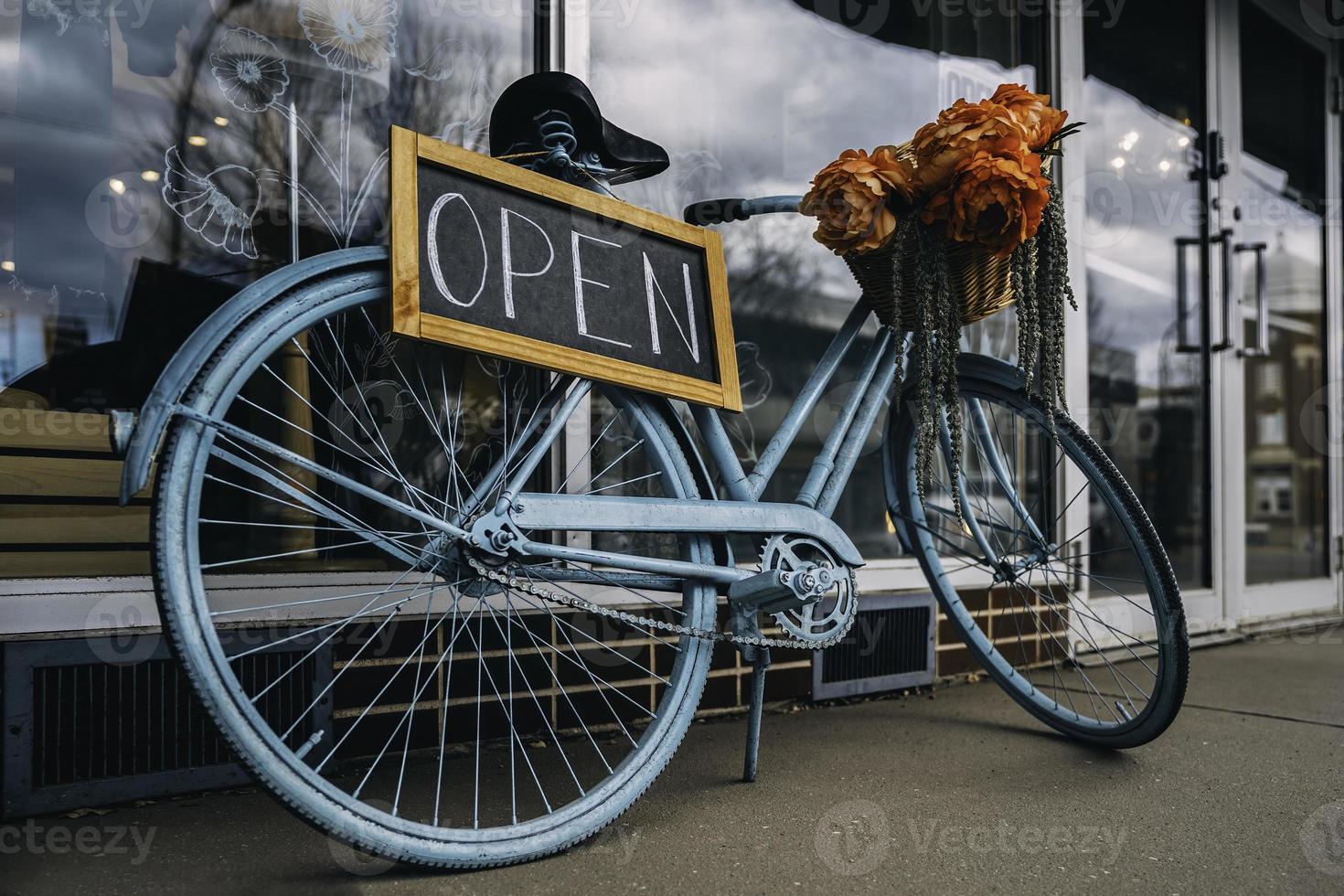 Open signboard. Bicycle. Creative sign for the store. Sign Board Open. Reopen businesses. photo