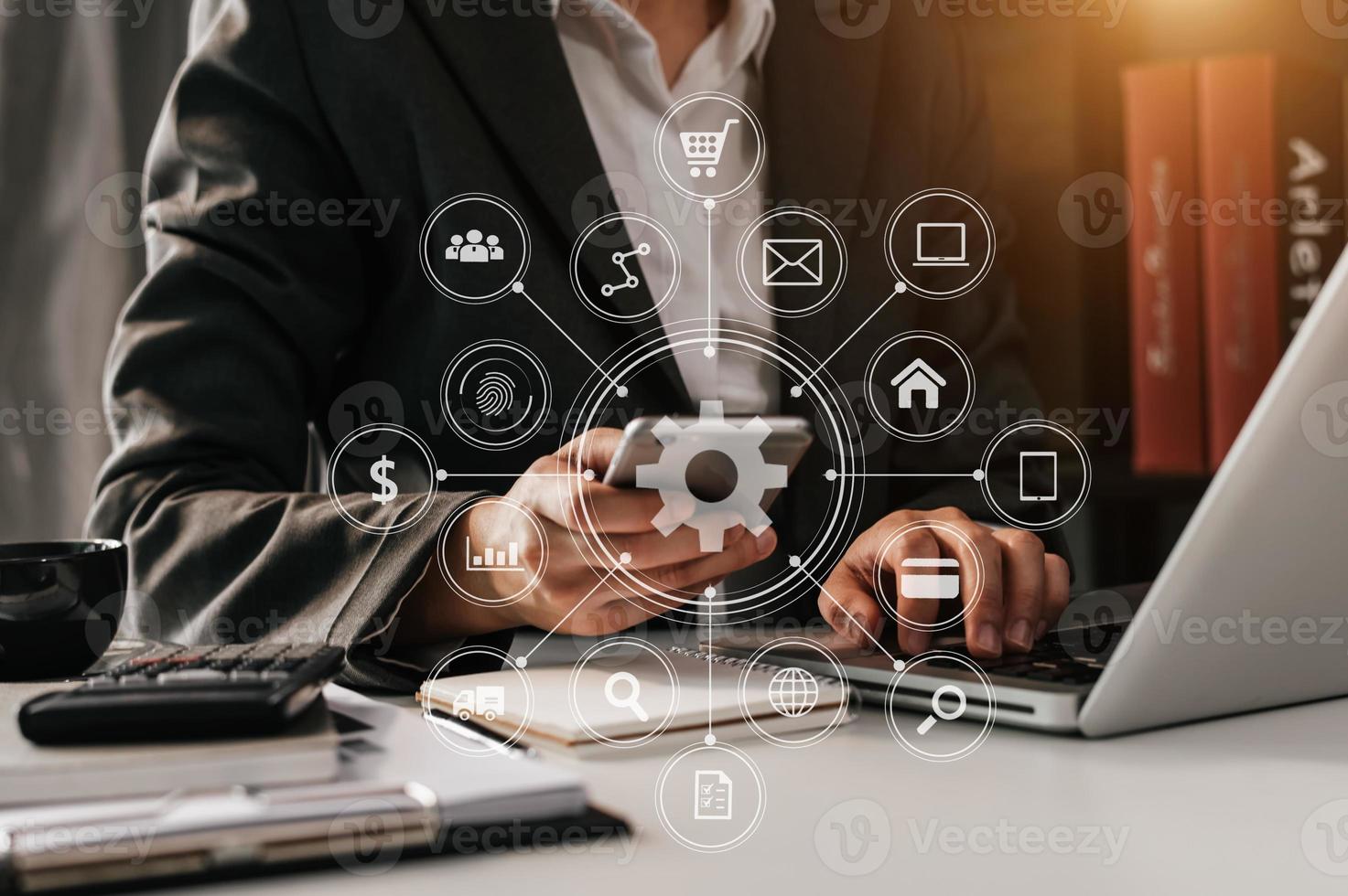 business woman hand working with laptop computer, tablet and smart phone in office with digital marketing media photo