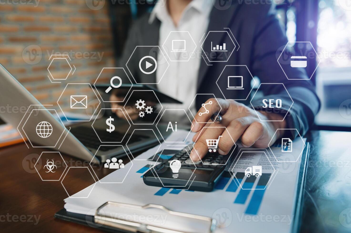 Businessman working with smart phone and laptop and digital tablet in  office media  in virtual icon photo