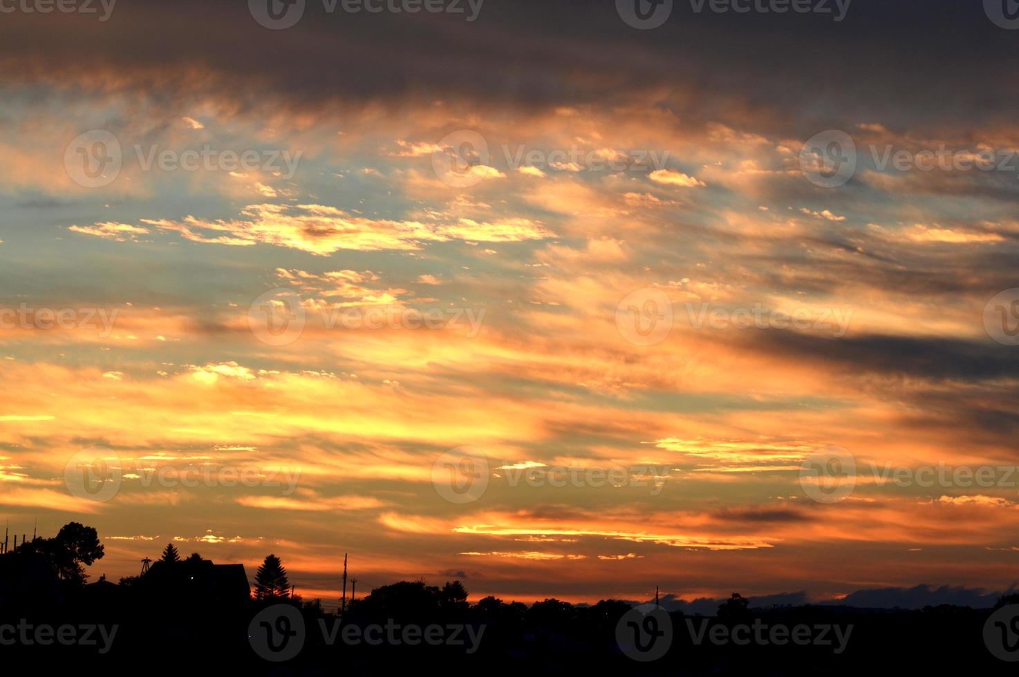 Beautiful orange sunset with clouds, nature photo background. Travel, vacation, holiday and relax theme. Gradient color. Sky texture, abstract nature background