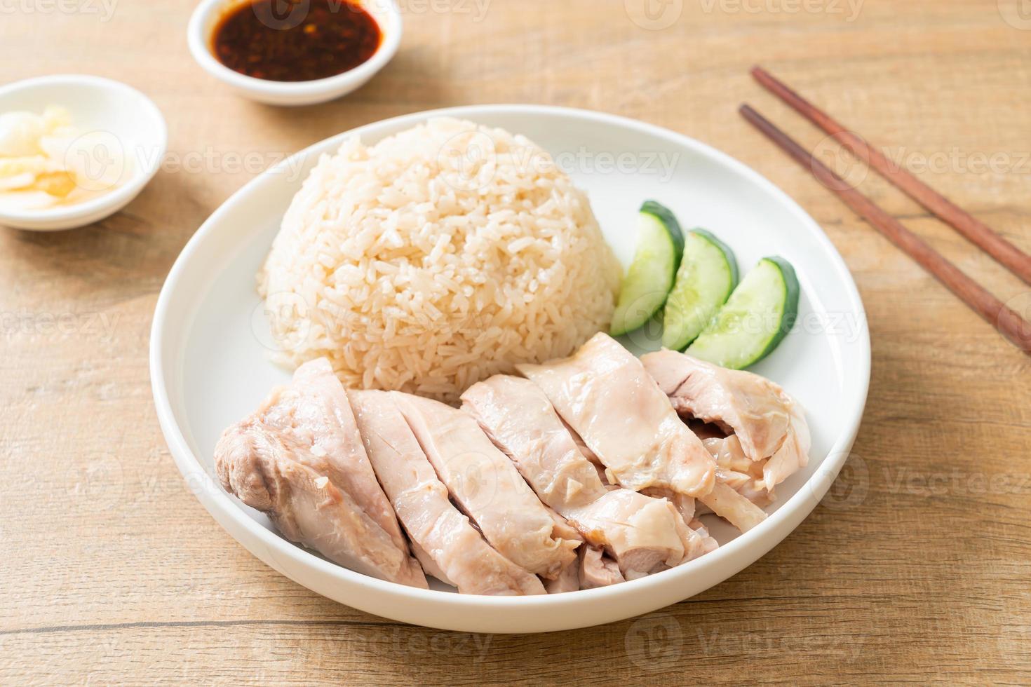 Hainanese chicken rice or rice steamed with chicken soup photo