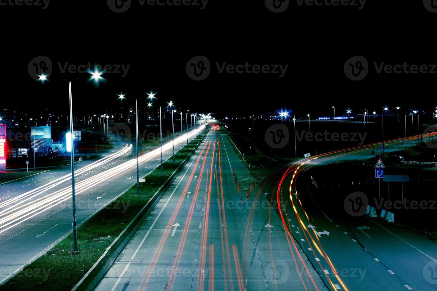 A highway with light trails. photo