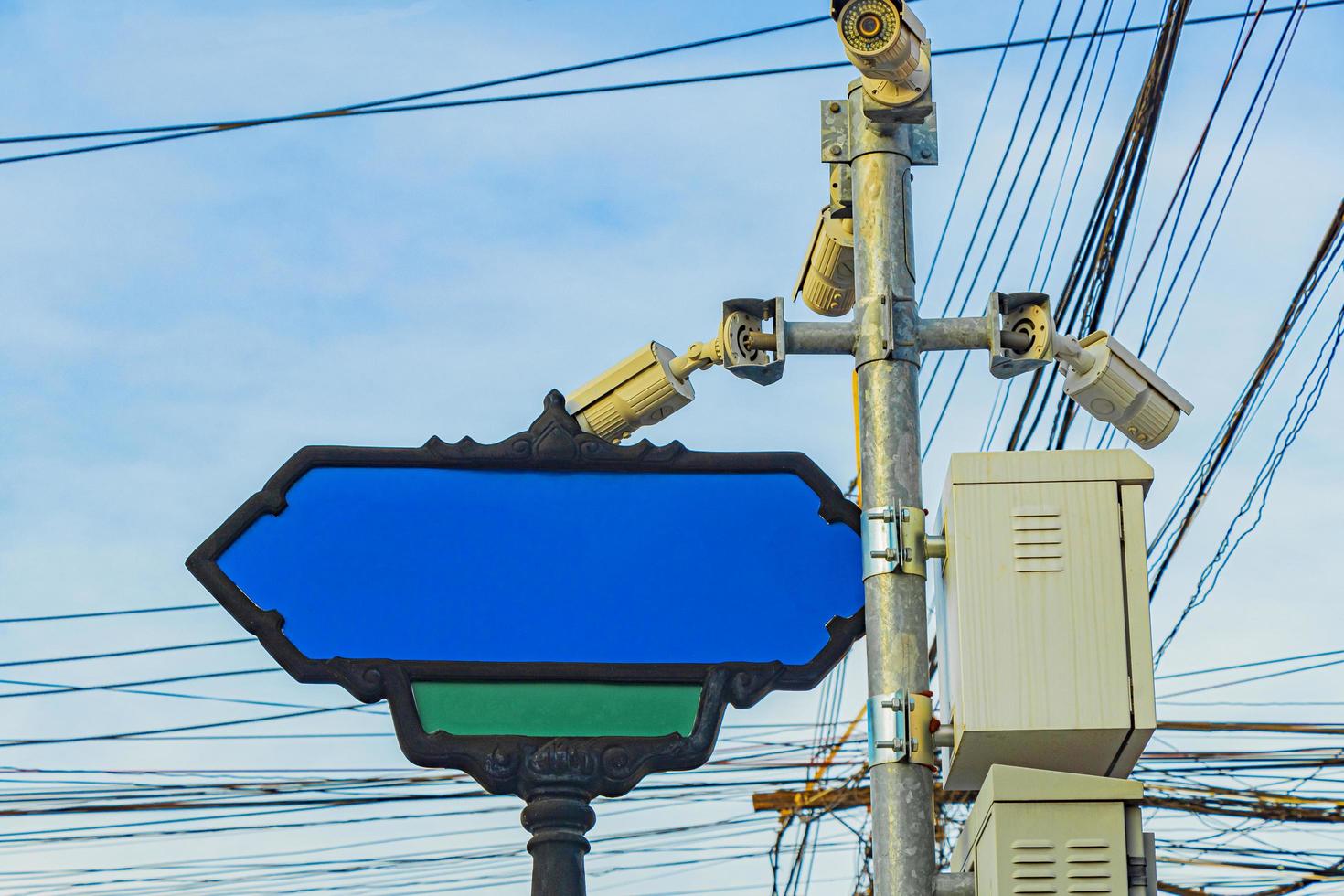 Blank empty blue typical Asian street road sign Bangkok Thailand. photo