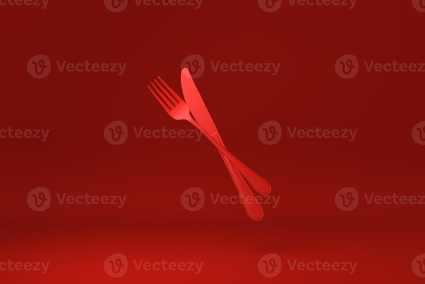 Red Fork and knife floating in Red background. minimal concept idea creative. monochrome. 3D render. photo