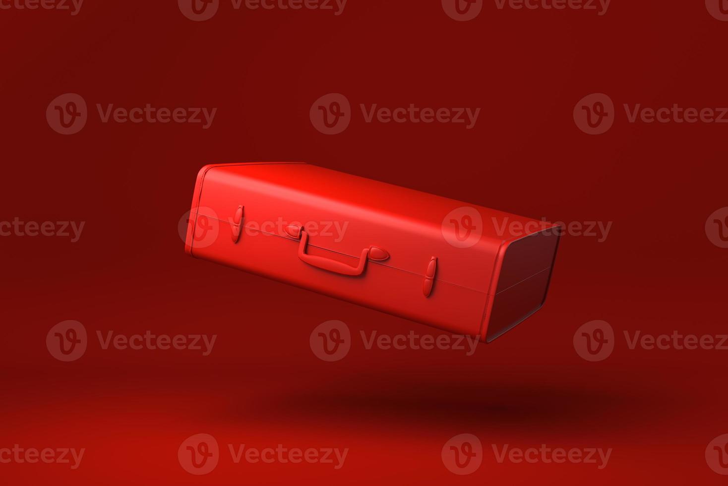 Red Travel Suitcase floating in red background. minimal concept idea creative. monochrome. 3D render. photo