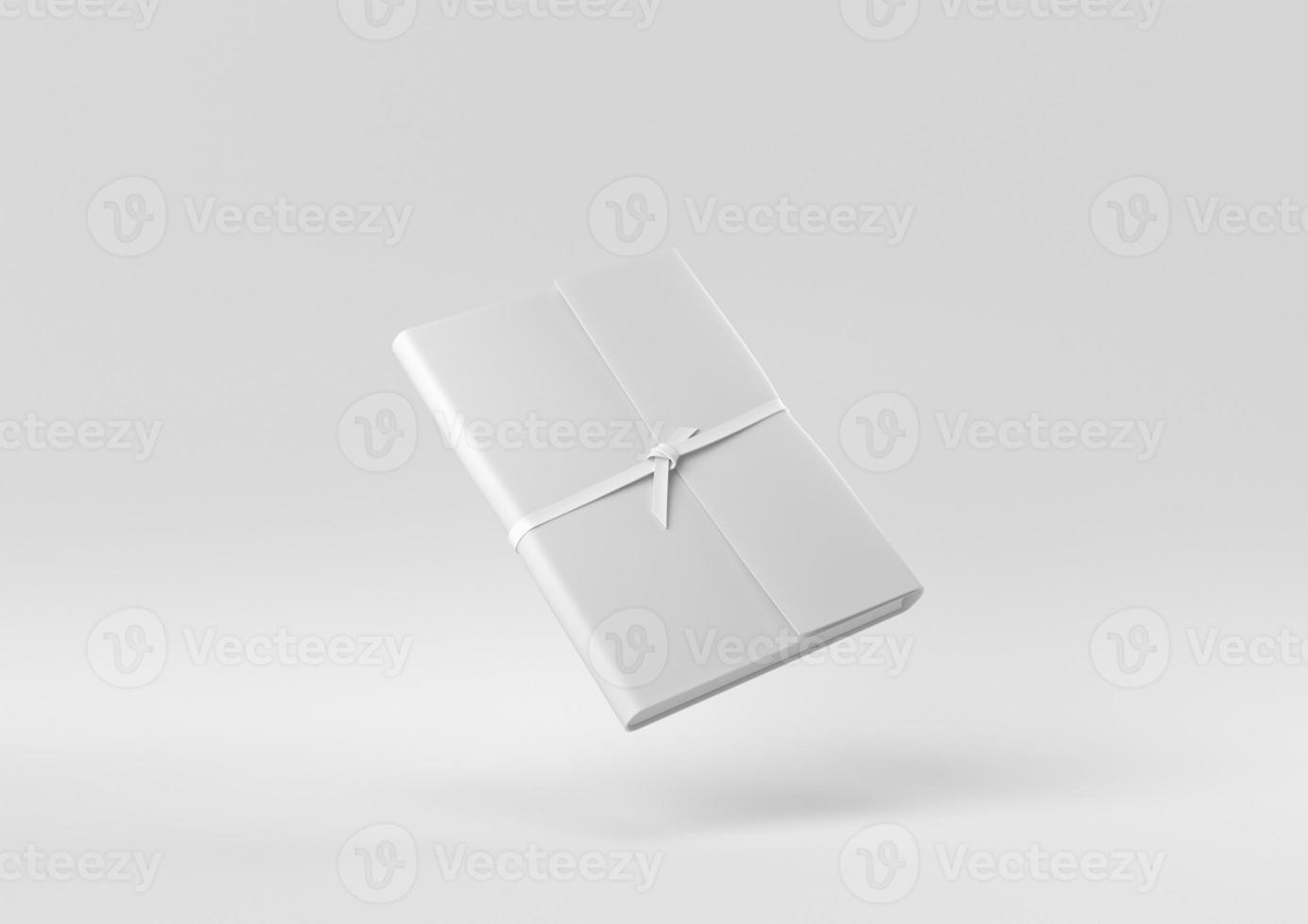 White Notebook floating in white background. minimal concept idea creative. monochrome. 3D render. photo