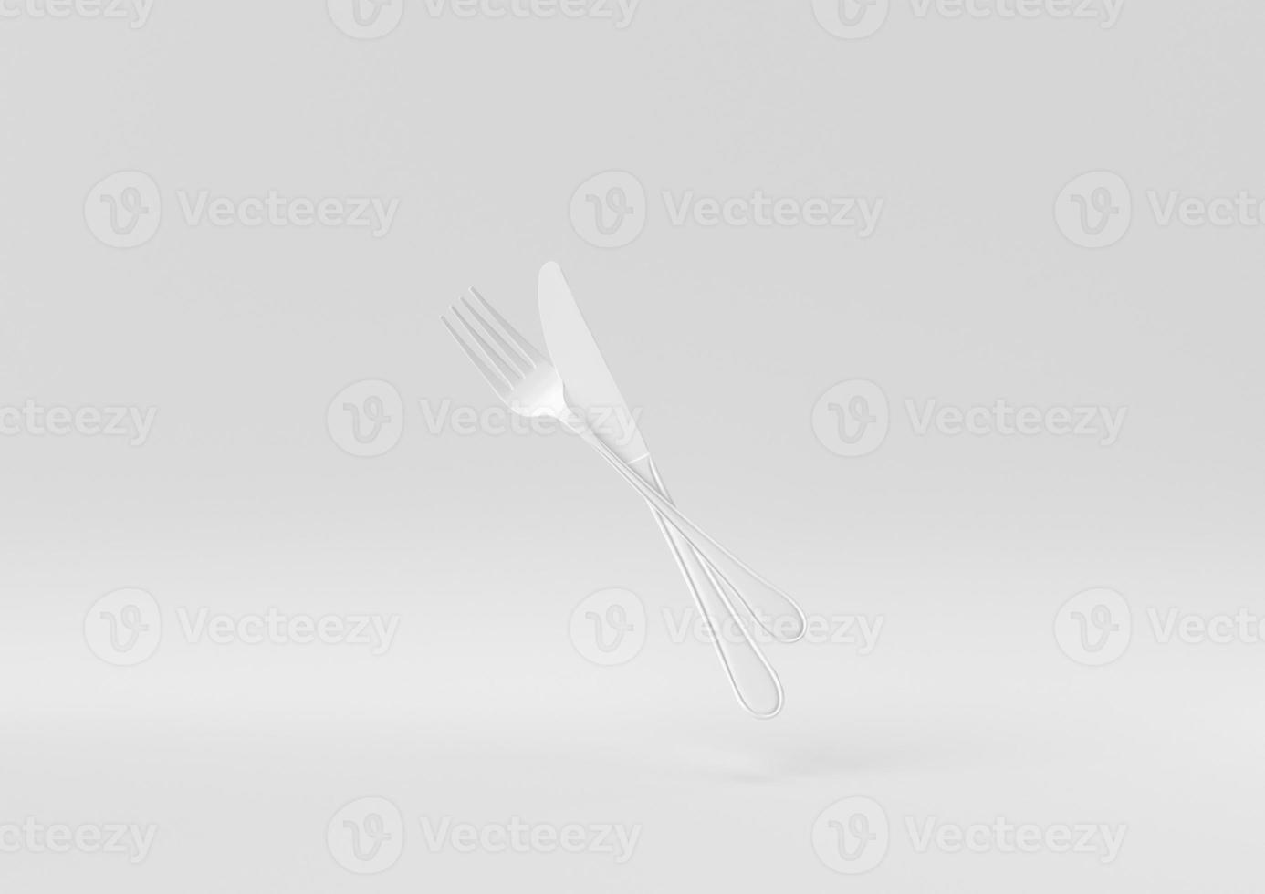 White Fork and knife floating in white background. minimal concept idea creative. monochrome. 3D render. photo