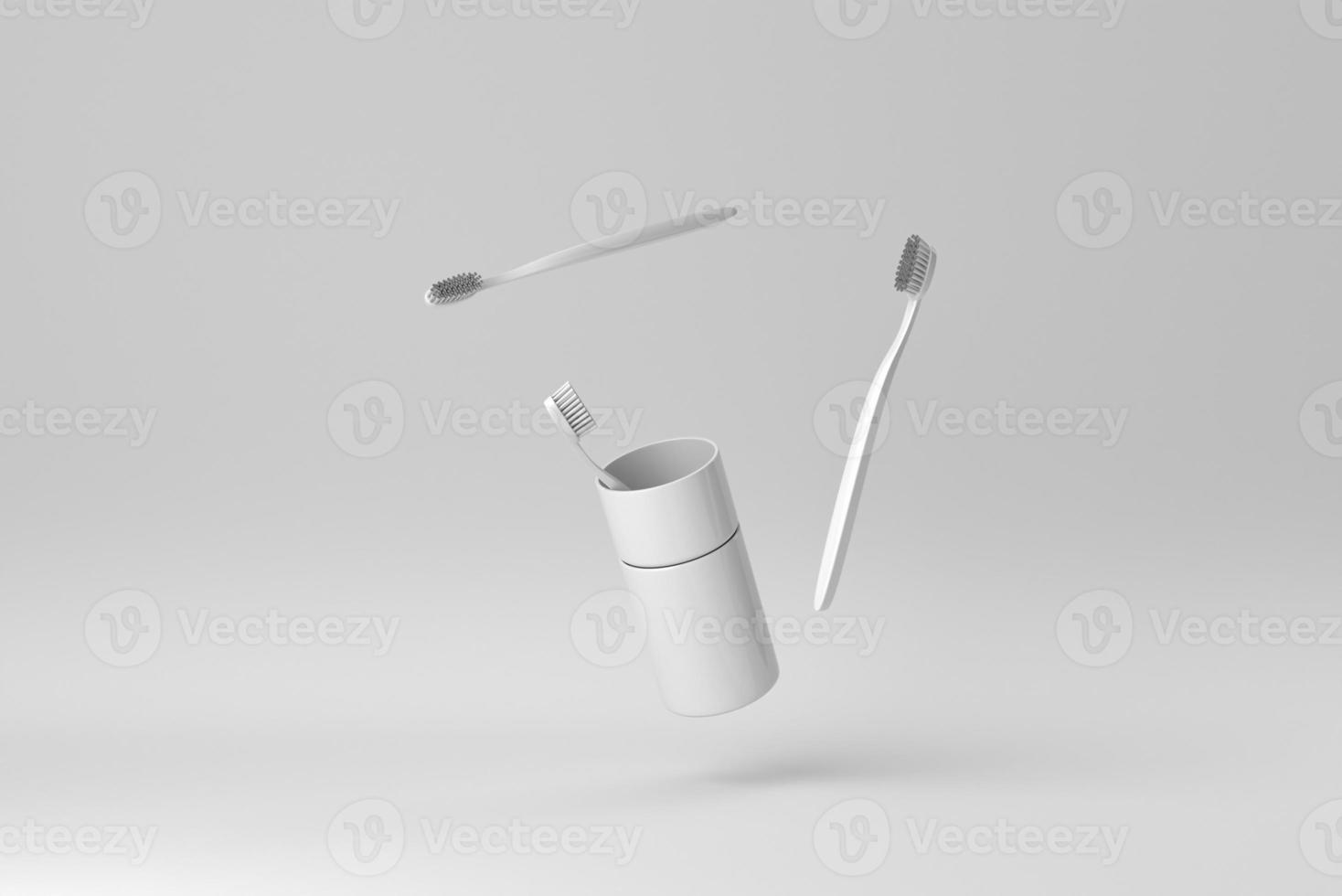 The toothbrushes in a glass on white background. minimal paper concept. 3D render. photo