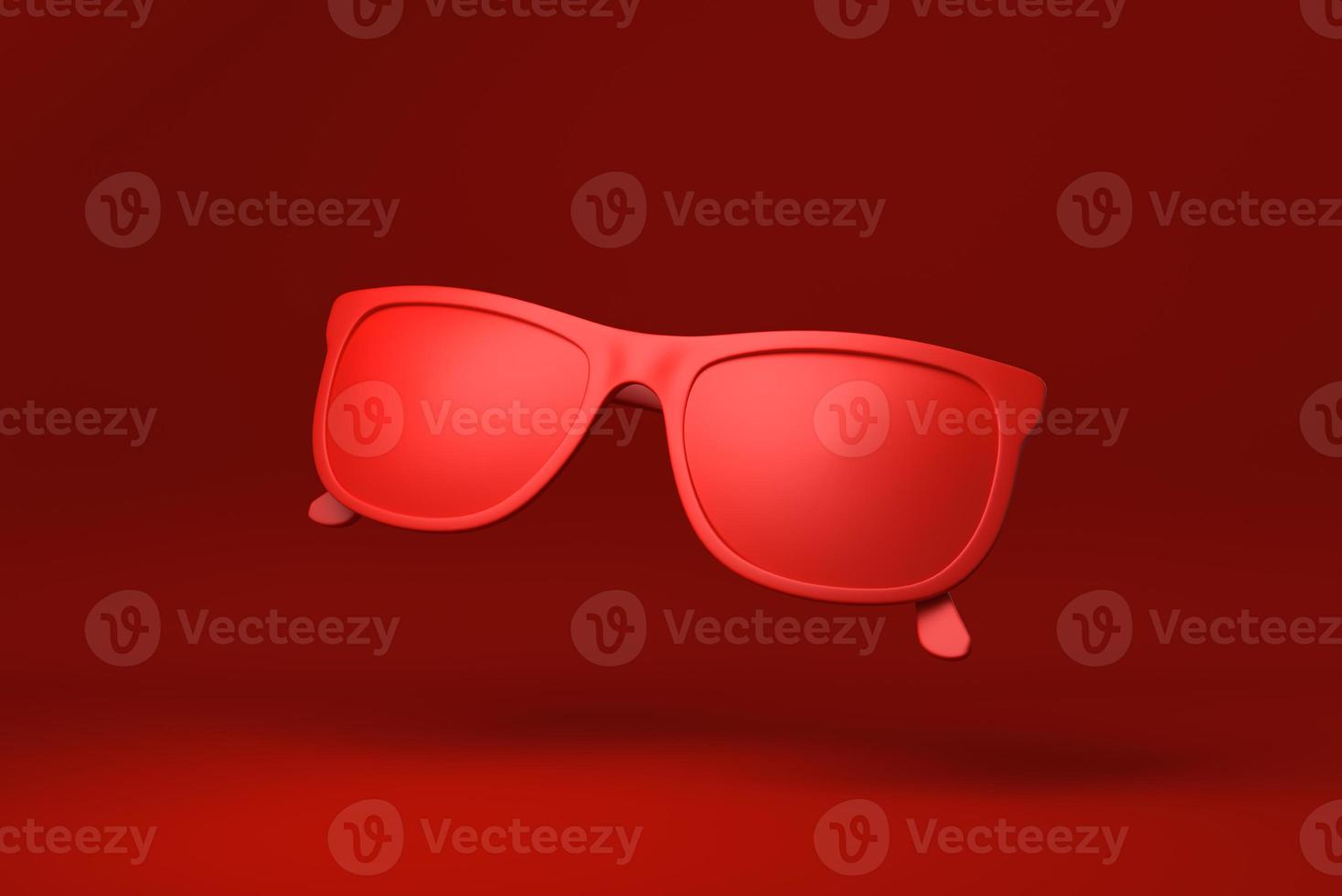 Red Glasses floating in red background. minimal concept idea creative. monochrome. 3D render. photo