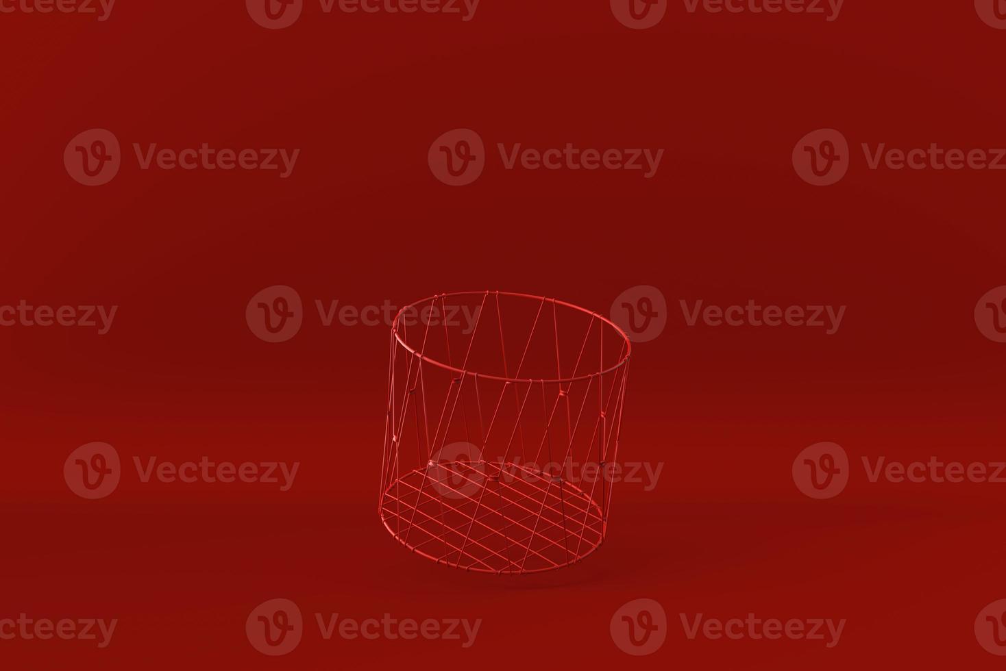 Red wire basket floating in red background. minimal concept idea creative. monochrome. 3D render. photo