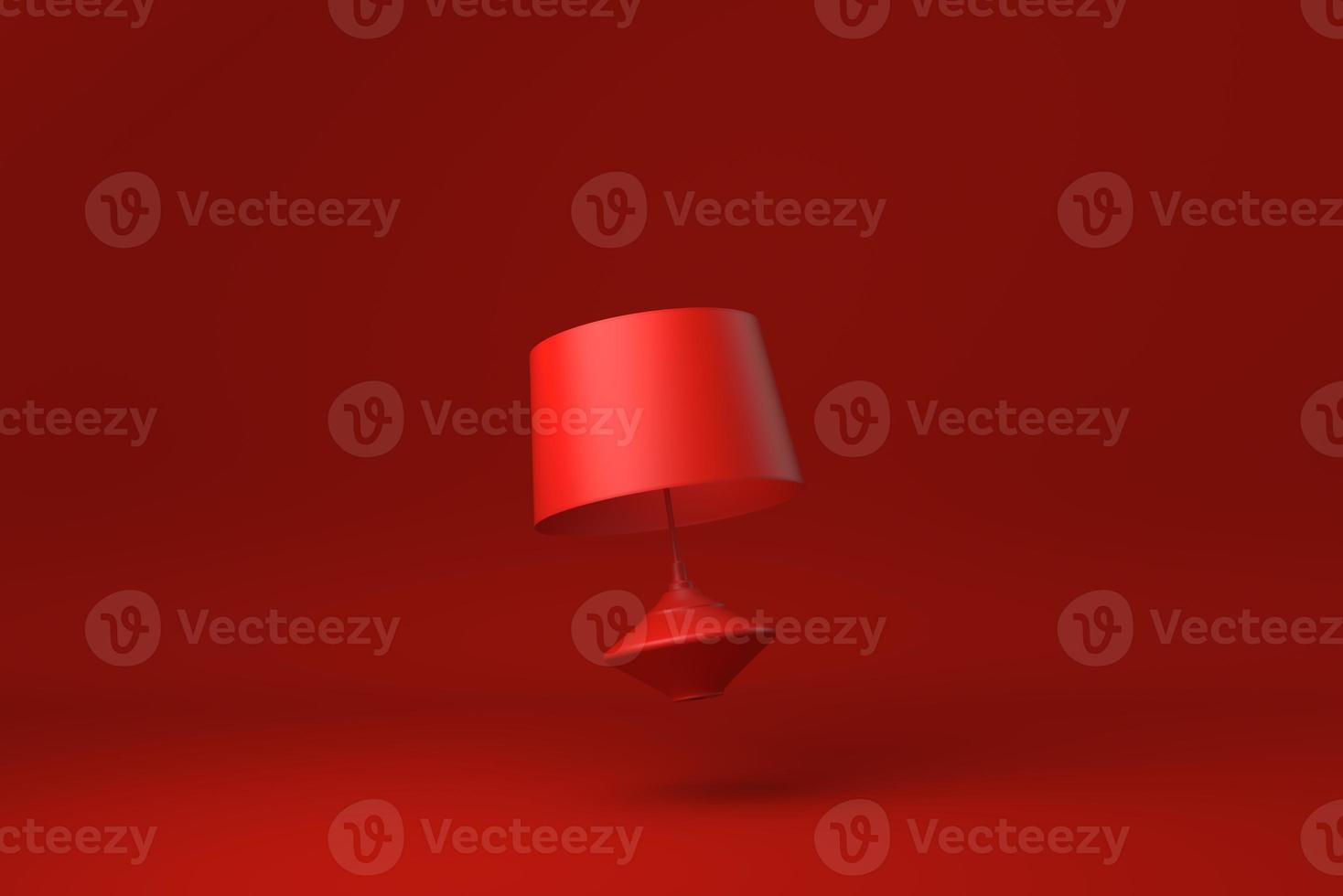 Red lampshade floating in Red background. minimal concept idea creative. monochrome. 3D render. photo