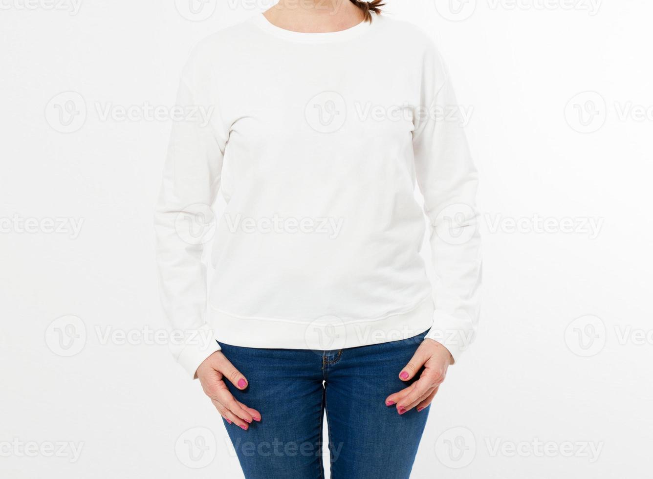 happy modern woman in white pullover posing on white background - mock up cropped image photo