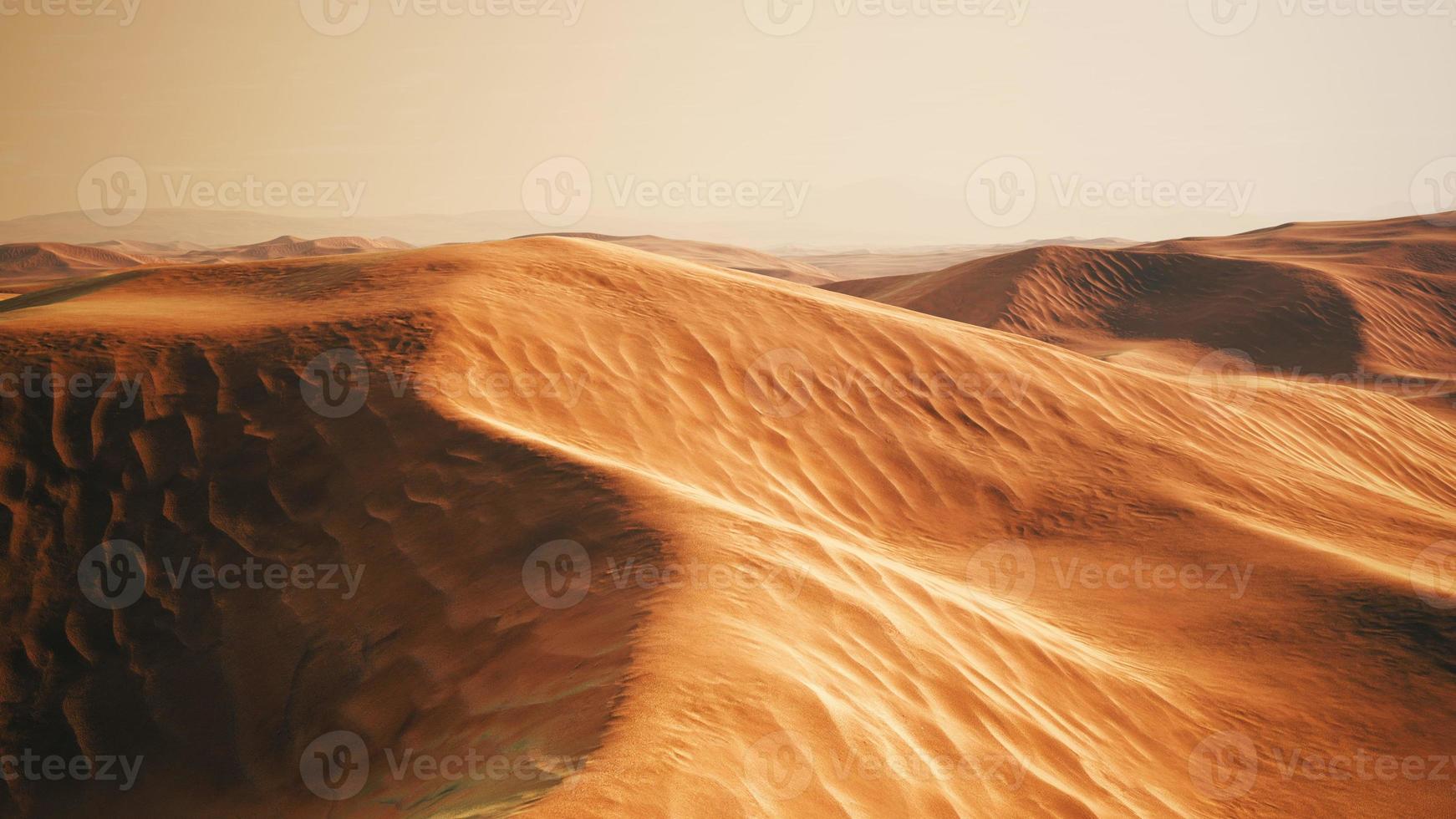 Sunset over the sand dunes in the desert. Death Valley, USA photo