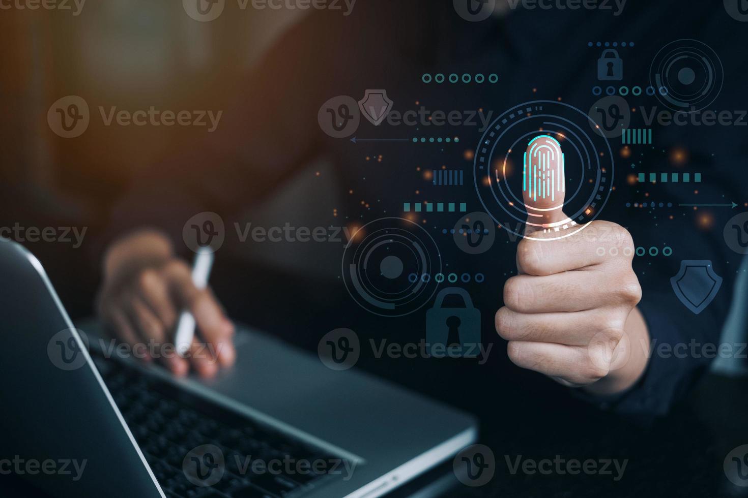 Woman using thumb to scan finger print with virtual guard and key for access biometric data by input password or fingerprint scanner for access security system , Futuristic technology concept. photo