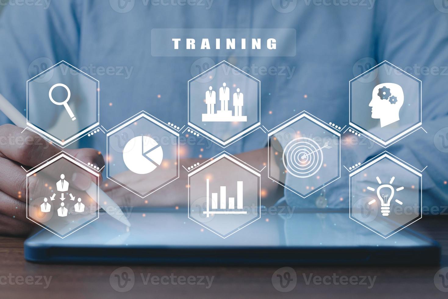 Businessman using a taplet to Training Webinar E-learning Skills Business Internet Concept. photo